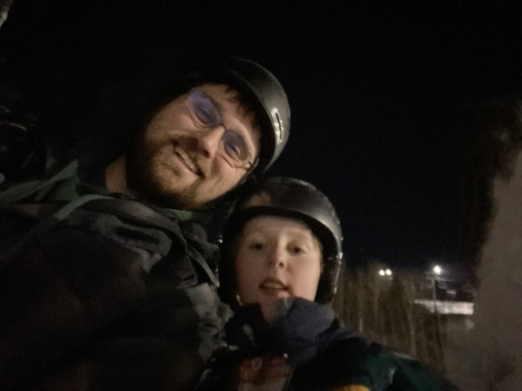 My son and I snowboarding